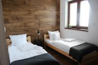 Postel nebo postele na pokoji v ubytování PALAVIA Apartments