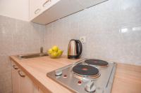 Kuchyňa alebo kuchynka v ubytovaní Apartments Kate