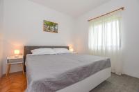 Posteľ alebo postele v izbe v ubytovaní Apartments Kate