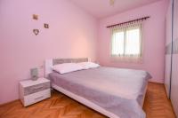 Posteľ alebo postele v izbe v ubytovaní Apartments Kate