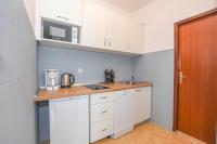 Kuchyňa alebo kuchynka v ubytovaní Apartments Kate