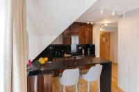 Kuchnia lub aneks kuchenny w obiekcie VacationClub - Rezydencja Karkonoska Apartament 10