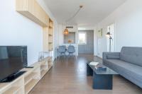 Telewizja i/lub zestaw kina domowego w obiekcie Apartaments La Perla Negra