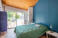 Posteľ alebo postele v izbe v ubytovaní Grande maison pour 6 personnes - 300m de la plage