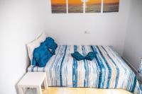 Posteľ alebo postele v izbe v ubytovaní Apartamento AGUAMAR