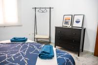 Posteľ alebo postele v izbe v ubytovaní Apartamento AGUAMAR