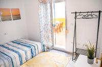 Posteľ alebo postele v izbe v ubytovaní Apartamento AGUAMAR