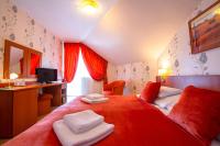 Posteľ alebo postele v izbe v ubytovaní Spa & Wellness Hotel Orchidea