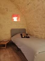 Krevet ili kreveti u jedinici u objektu Le refuge de la Sall&eacute;e