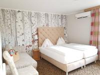Postel nebo postele na pokoji v ubytování Hotel Schachner