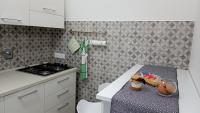 Kuchyňa alebo kuchynka v ubytovaní Holiday Home Tarinuzza