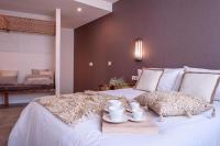 Cama o camas de una habitación en CANDIL SUITE Origen