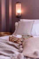 Cama o camas de una habitación en CANDIL SUITE Origen