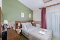 Łóżko lub łóżka w pokoju w obiekcie Hotel Yarden by Artery Hotels