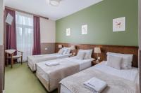 Łóżko lub łóżka w pokoju w obiekcie Hotel Yarden by Artery Hotels