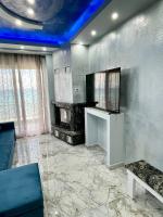 Televízia a/alebo spoločenská miestnosť v ubytovaní CHANIOTH LUXURY SUITES BY MAKHOME