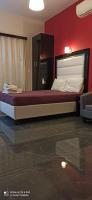Posteľ alebo postele v izbe v ubytovaní Spiros Rooms