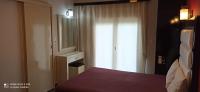 Posteľ alebo postele v izbe v ubytovaní Spiros Rooms