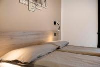 A bed or beds in a room at Appartamento Federia Casa Campacc