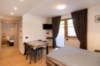 A bed or beds in a room at Appartamento Federia Casa Campacc