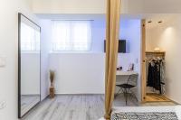Televízia a/alebo spoločenská miestnosť v ubytovaní Felicite apartments Naxos