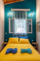 Posteľ alebo postele v izbe v ubytovaní Casa Max Palaiokastritsa Corfu