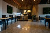 Reštaurácia alebo iné gastronomické zariadenie v ubytovaní Hotel Grey Spa