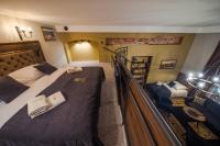 Postel nebo postele na pokoji v ubytování Ars Cracovia Apartments