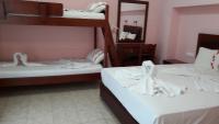A bed or beds in a room at Smaro Studios