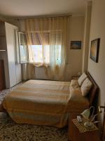 Łóżko lub łóżka w pokoju w obiekcie Casa Anna