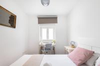 Łóżko lub łóżka w pokoju w obiekcie El Hogar de Betania