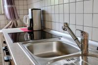 Kuchyňa alebo kuchynka v ubytovaní Apartmani Janja