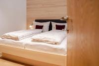 Posteľ alebo postele v izbe v ubytovaní Apartment Fitsch