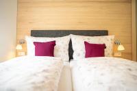 Posteľ alebo postele v izbe v ubytovaní Apartment Fitsch