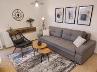 Część wypoczynkowa w obiekcie NewTown Apartment