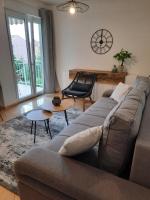 Część wypoczynkowa w obiekcie NewTown Apartment