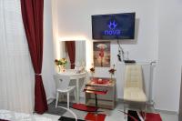 Televízia a/alebo spoločenská miestnosť v ubytovaní Asklipiou New Smart Mondern Central Studio