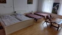 Posteľ alebo postele v izbe v ubytovaní Dráva Völgye Vendégház