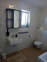 Kúpeľňa v ubytovaní Apartments DaSara
