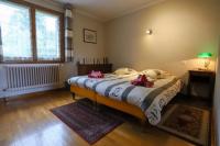 Posteľ alebo postele v izbe v ubytovaní Le Vintage grand appartement 4 étoiles avec jardin proche du lac