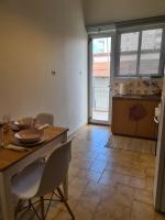 A kitchen or kitchenette at Seaside Apartment in Xilokastro - Thalassa Blue by Booking Kottas