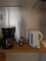 Coffee and tea making facilities at Seaside Apartment in Xilokastro - Thalassa Blue by Booking Kottas