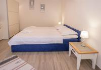 Posteľ alebo postele v izbe v ubytovaní Eleonora Apartments