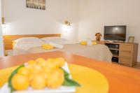 Posteľ alebo postele v izbe v ubytovaní Eleonora Apartments