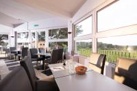 Et opholdsområde på Hotel Les Rocailles