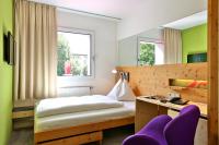 Posteľ alebo postele v izbe v ubytovaní Hotel Steinerwirt1493
