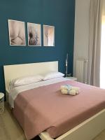 Łóżko lub łóżka w pokoju w obiekcie Home Demetra