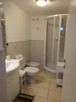 a bathroom with a toilet and a sink and a shower at Villa Playa del Sol -B4 in Saint-Tropez