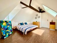 Łóżko lub łóżka w pokoju w obiekcie Toutes voiles dehors - Vue mer & château - Cosy