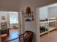 Łóżko lub łóżka w pokoju w obiekcie Schieszl Apartments Zamárdi 3